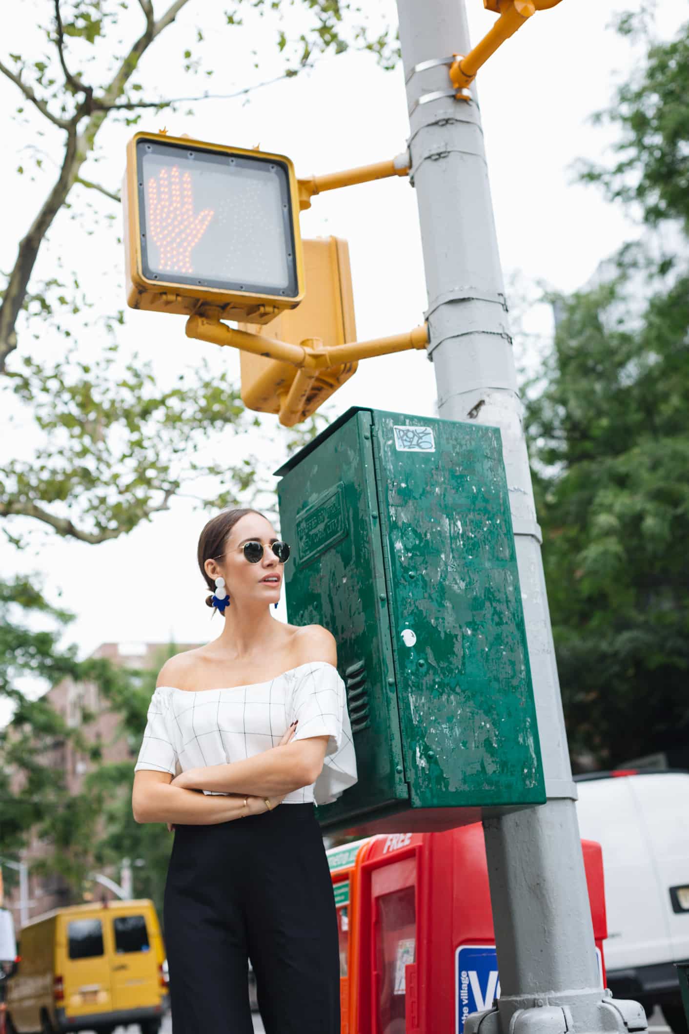 Louise Roe wearing off shoulder top in NYC