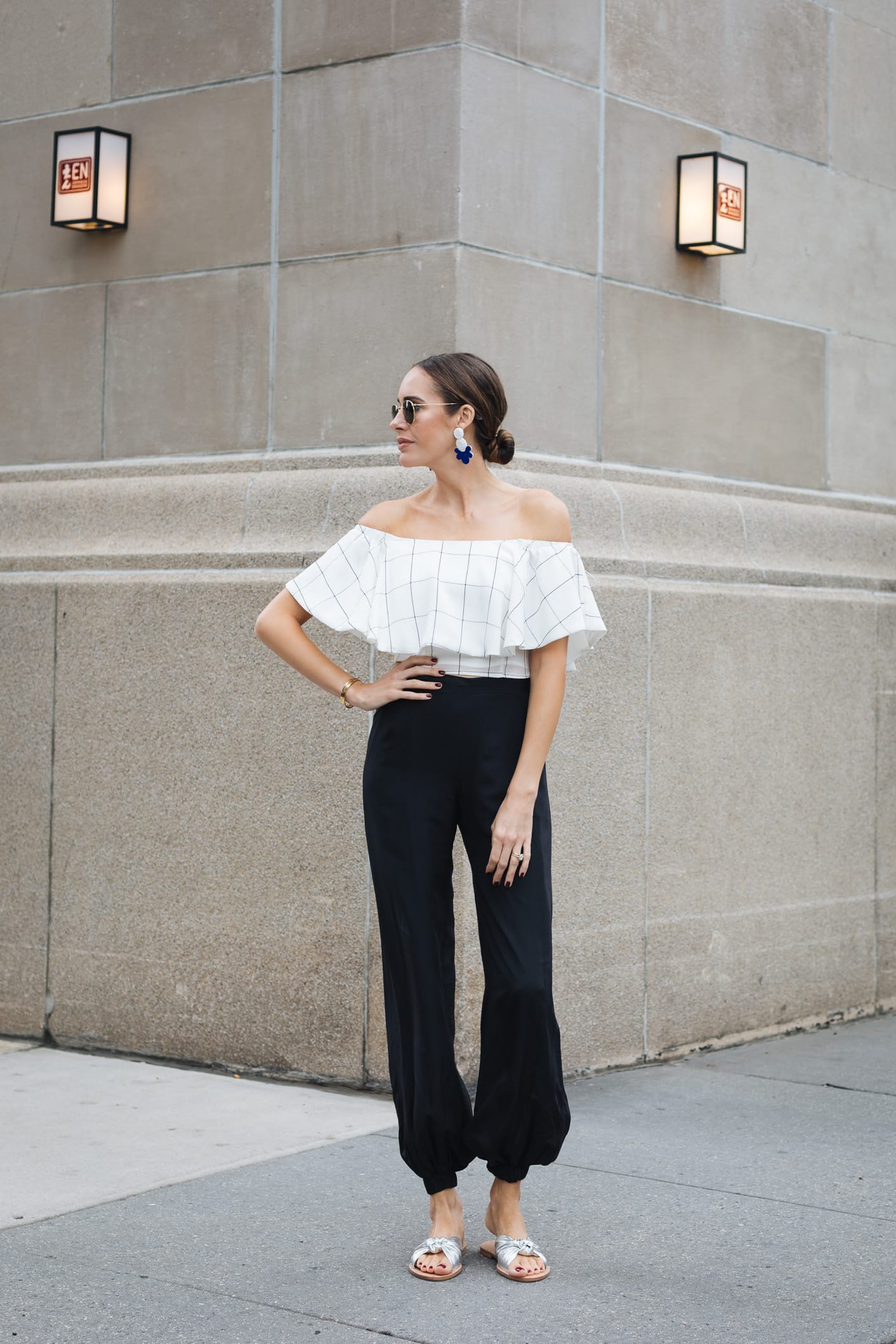 Louise Roe wearing off shoulder top in NYC