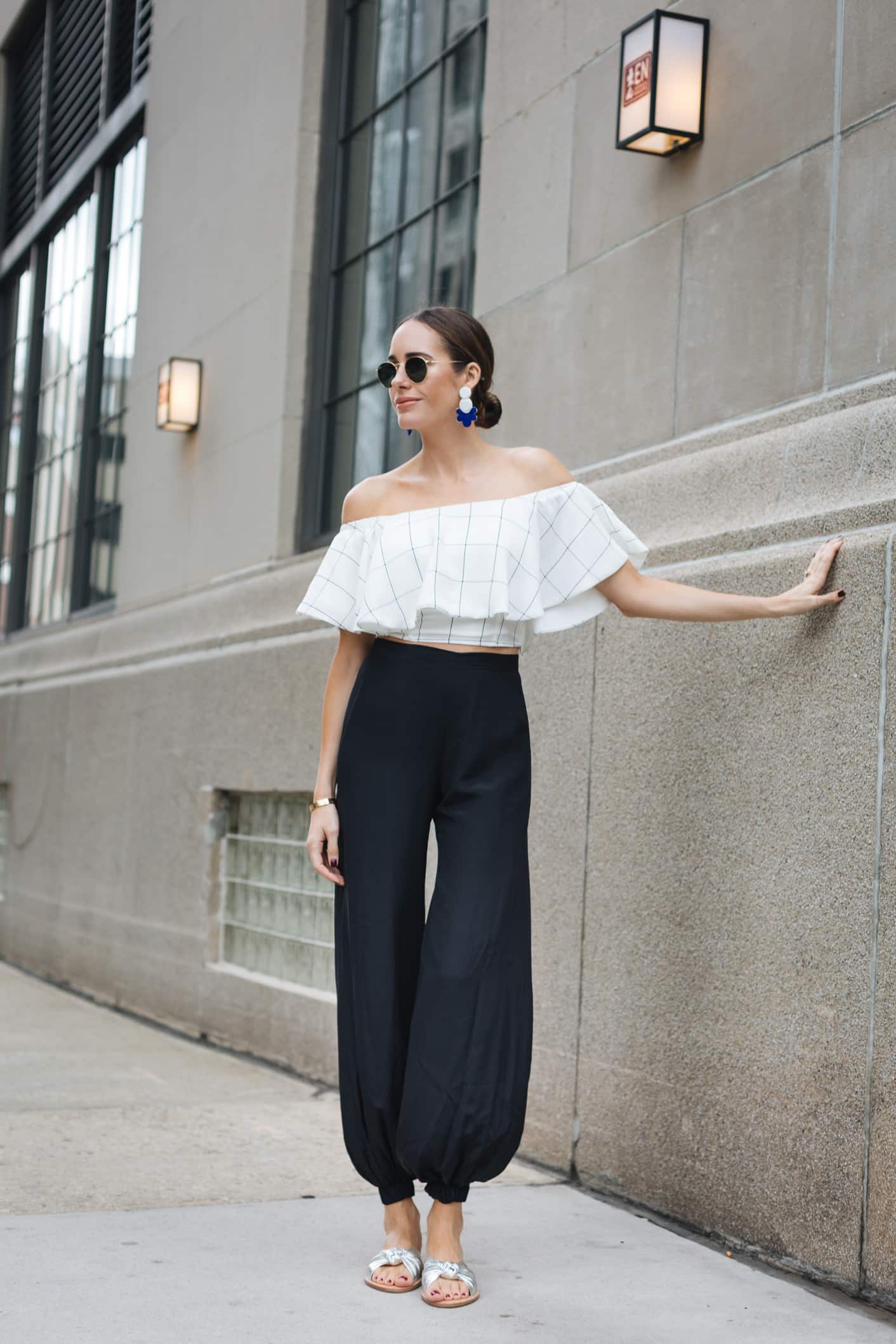 Louise Roe wearing off shoulder top in NYC