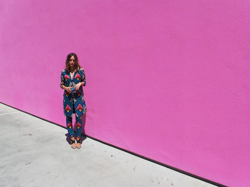 streetstyle fashion mara hoffman suit on a pink wall- via Front Roe, a fashion blog by Louise Roe