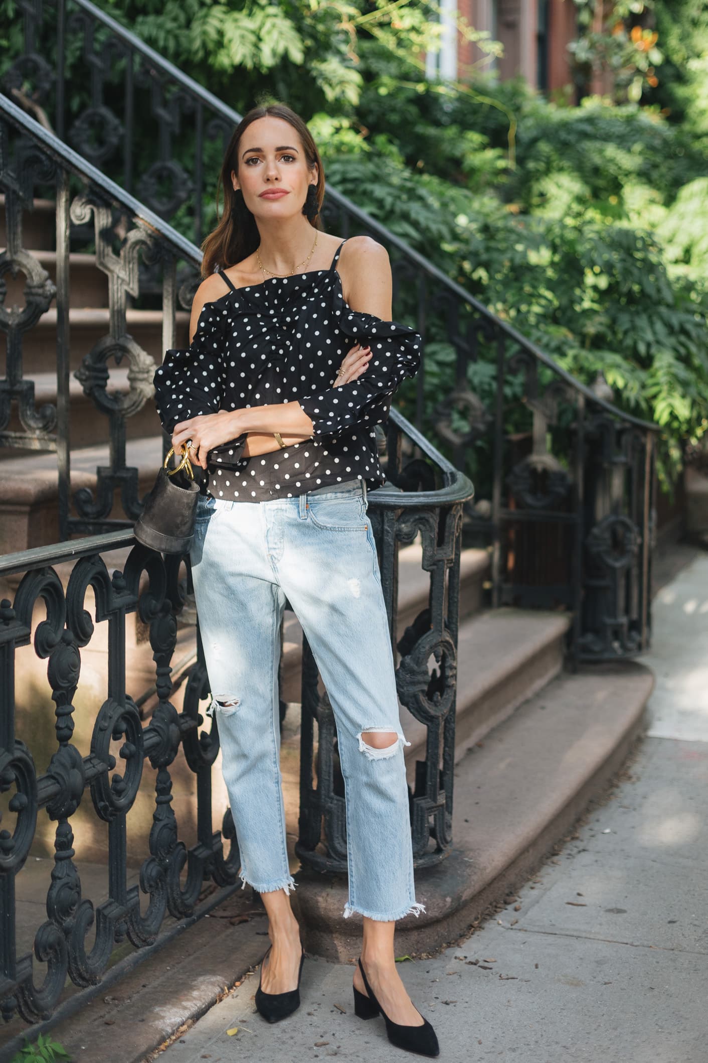 Louise Roe wearing polka dot top and mom jeans in NYC