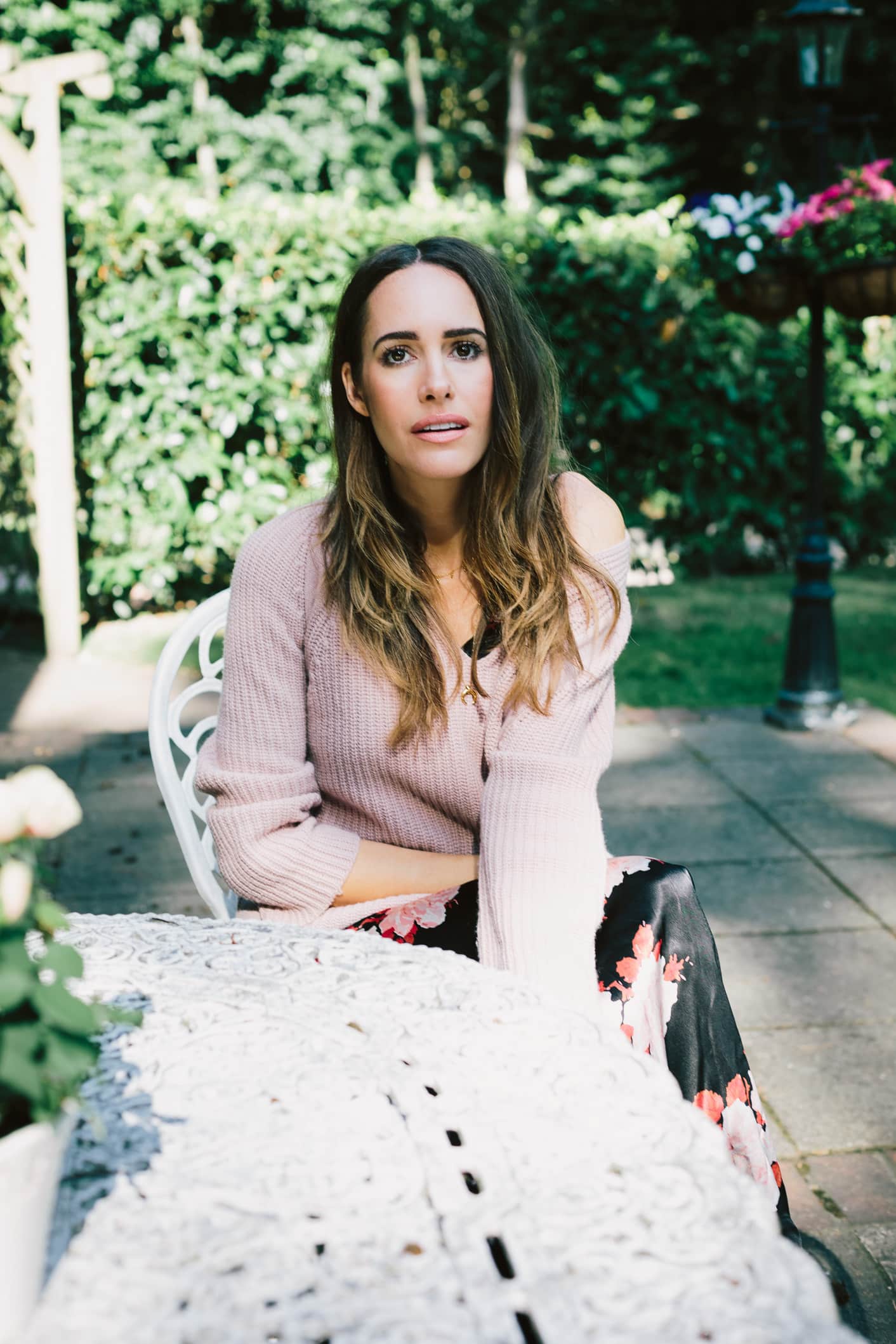 Louise Roe wearing a sweater and slip dress fall outfit