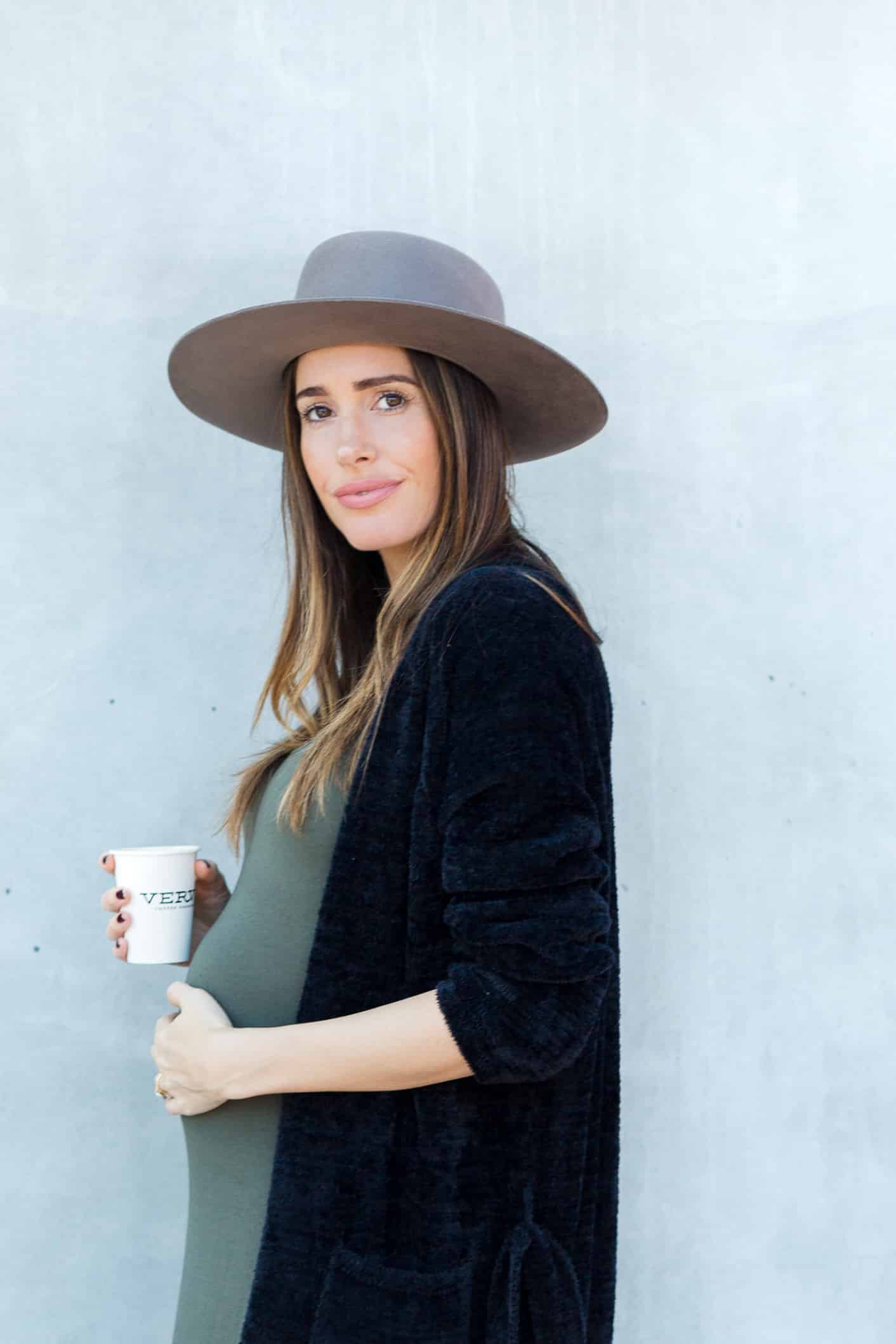 Louise Roe maternity style featuring studded ankle booties and maxi dress