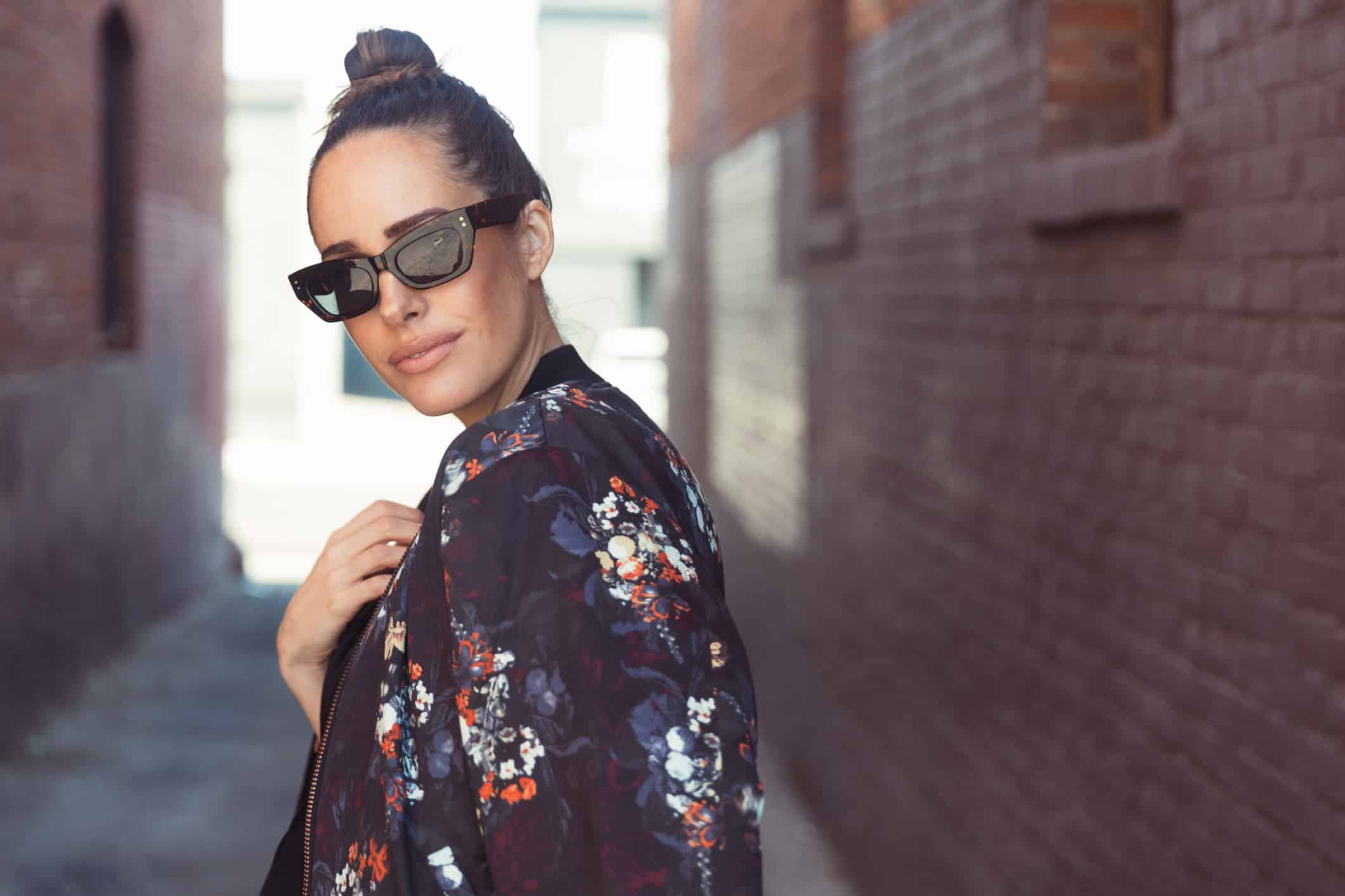 Louise Roe wearing Envie De Francaise jumpsuit Gestuz jacket Pared eyewear sunglasses Polene handbag and burgundy heels