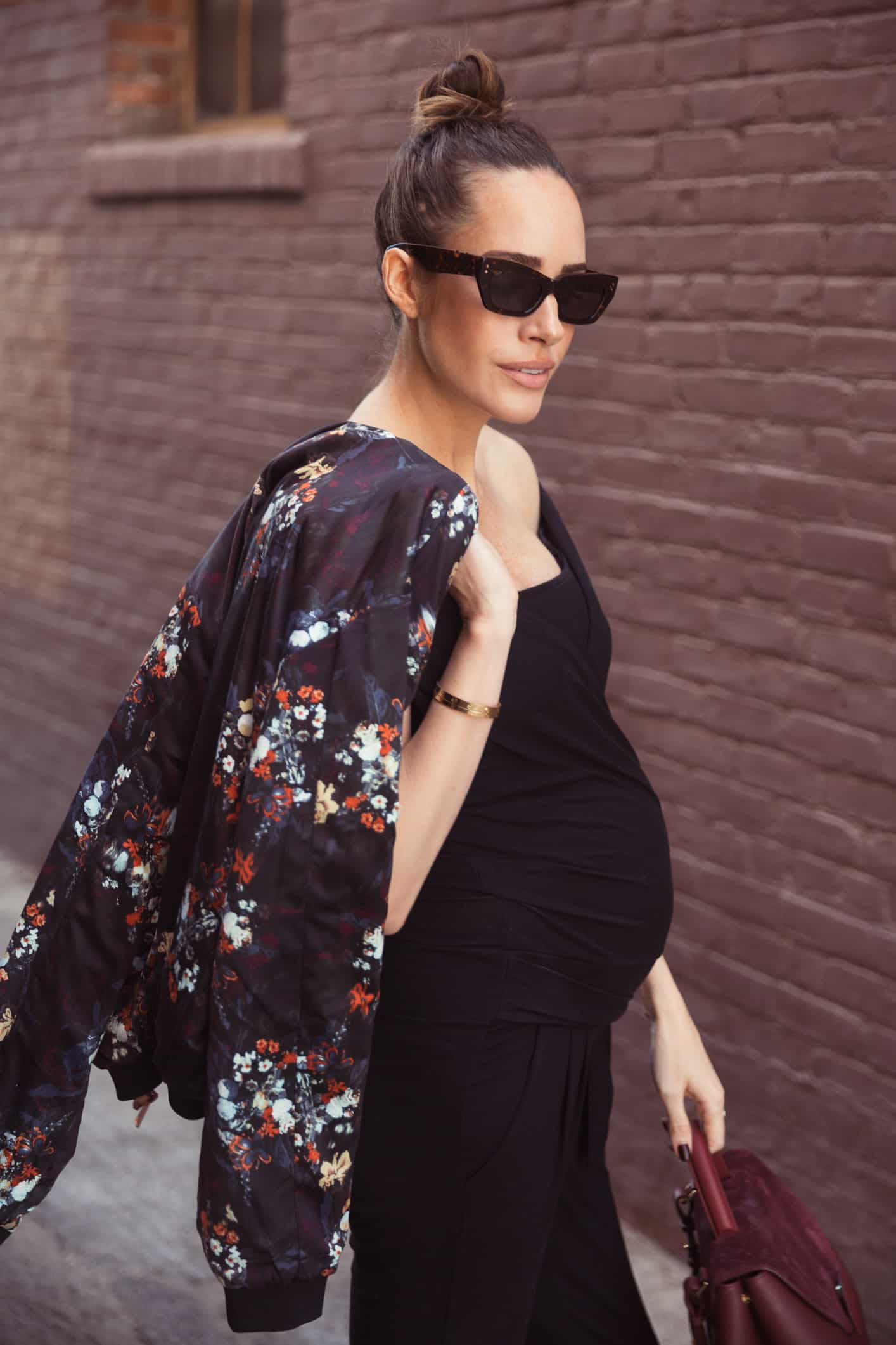 Louise Roe wearing Envie De Francaise jumpsuit Gestuz jacket Pared eyewear sunglasses Polene handbag and burgundy heels