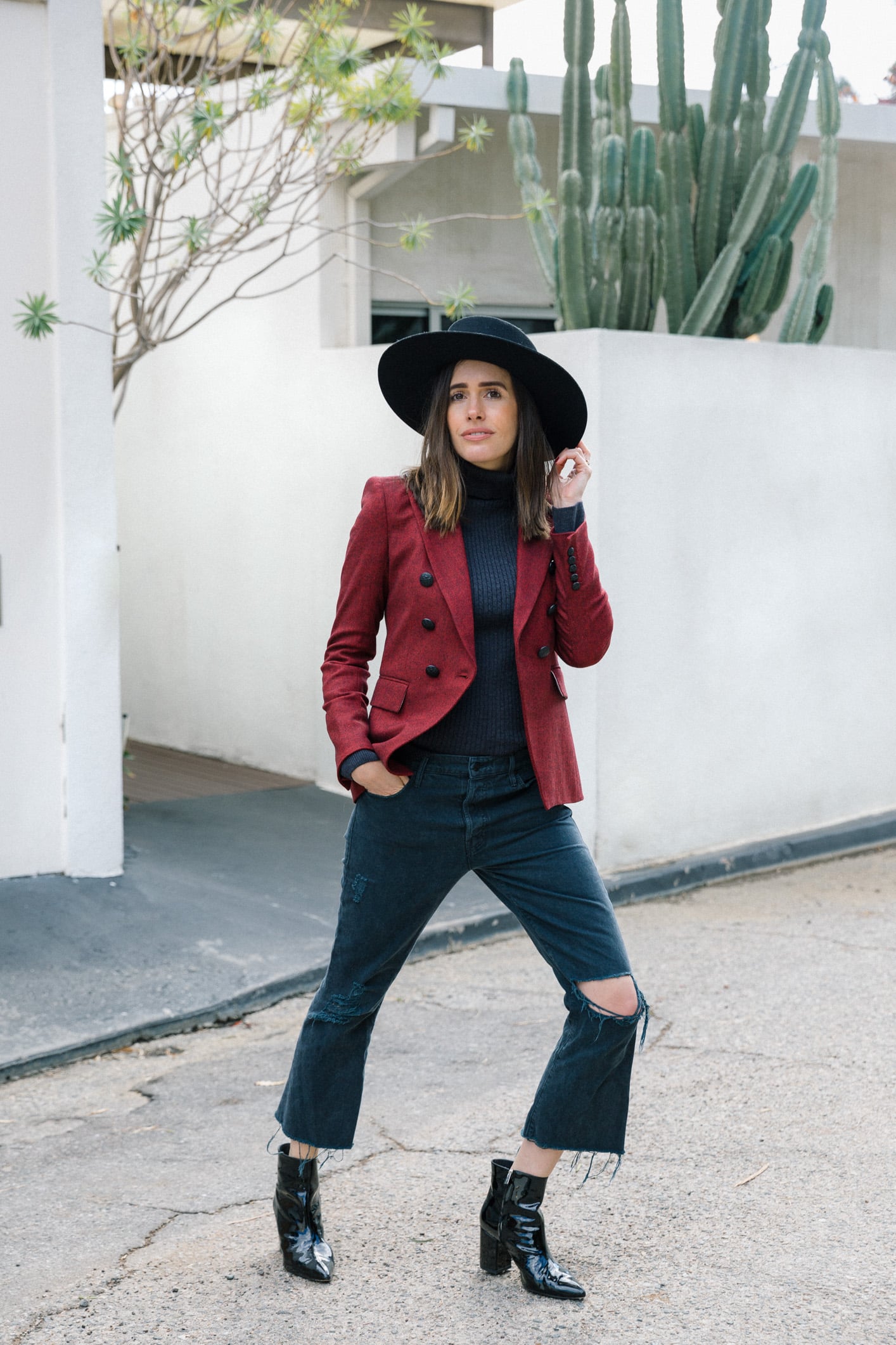 Louise Roe motherhood lessons wearing veronica beard blazer frame jeans anine bing boots and lack of colour hat
