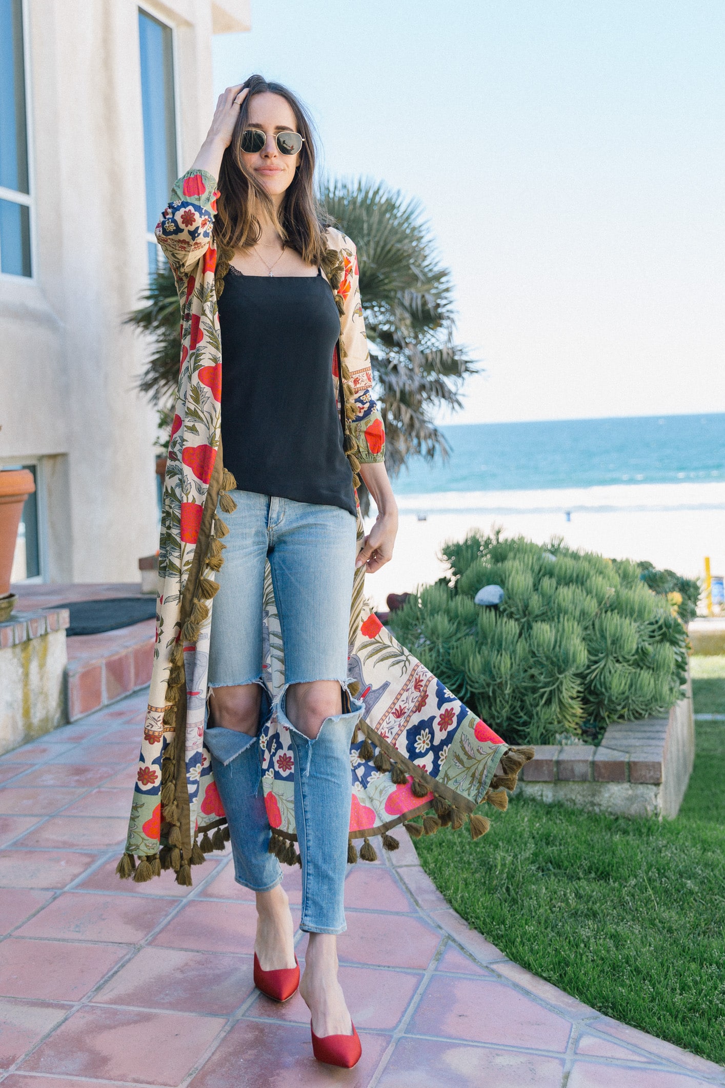 Louise Roe wearing printed kimono jeans and who what wear mules