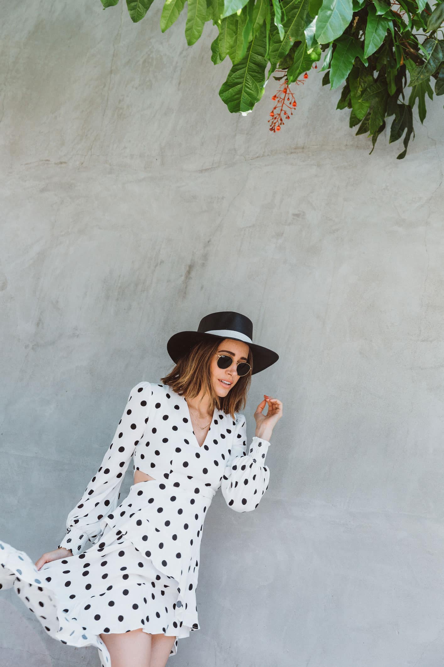 Louise Roe wearing summer polka dot dress and leather mules